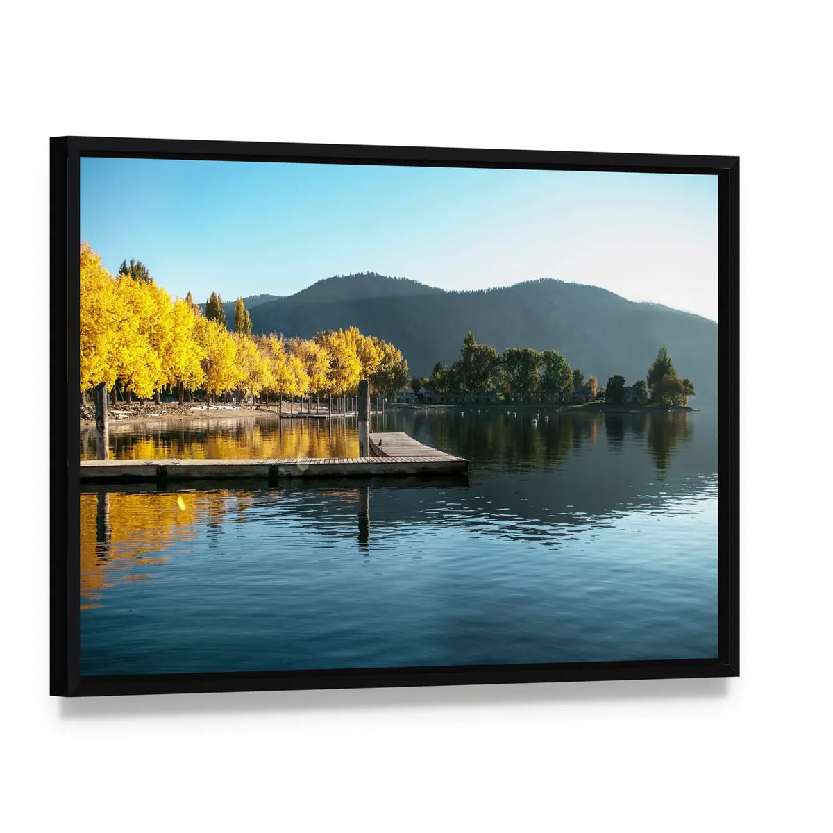 Fall Sunrise Over Lake with Wooden Dock Canvas Wall Art, framed canvas in a black floater frame, angled product view