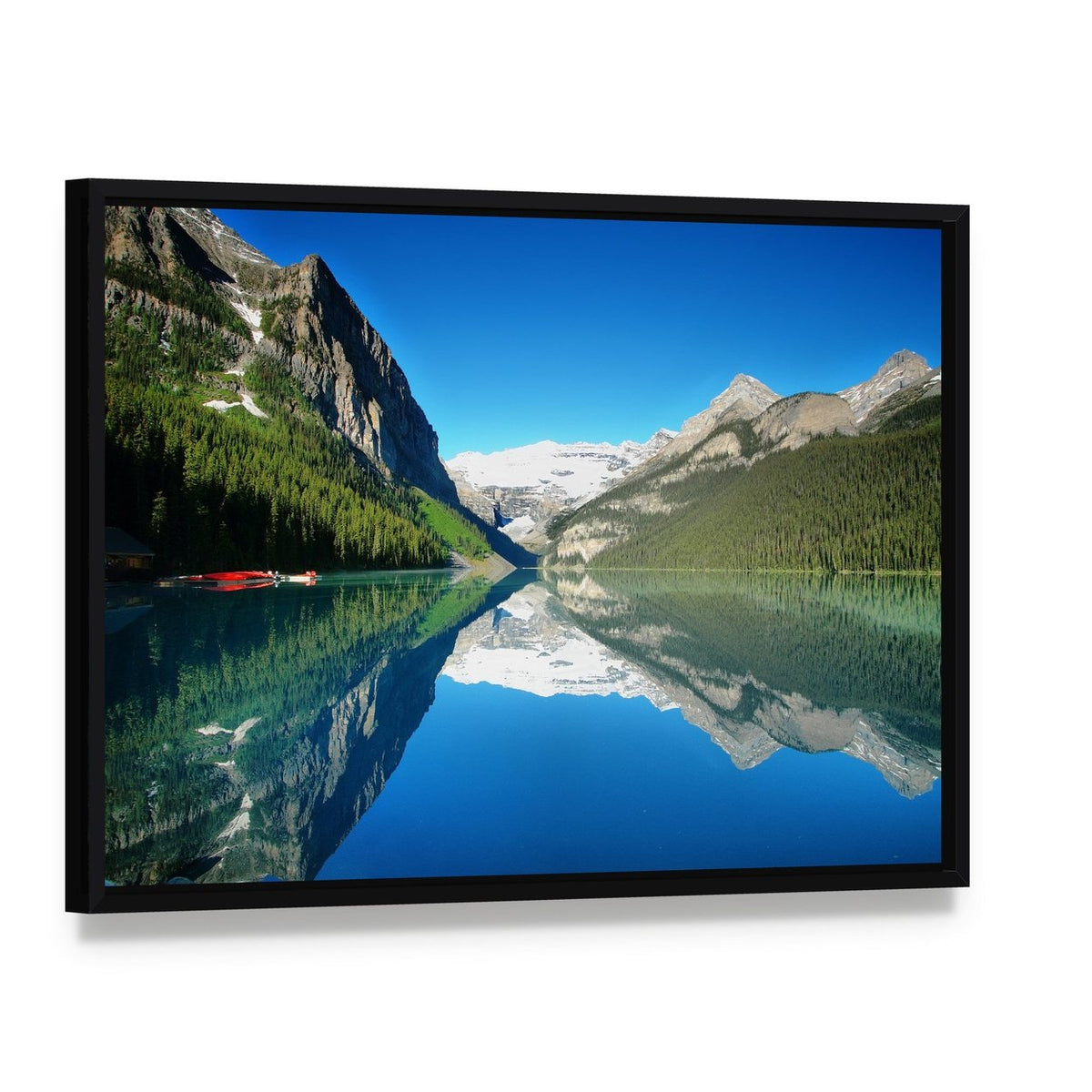 Mountain Lake Reflection with Red Boats Canvas Wall Art, framed canvas in a black floater frame, angled product view