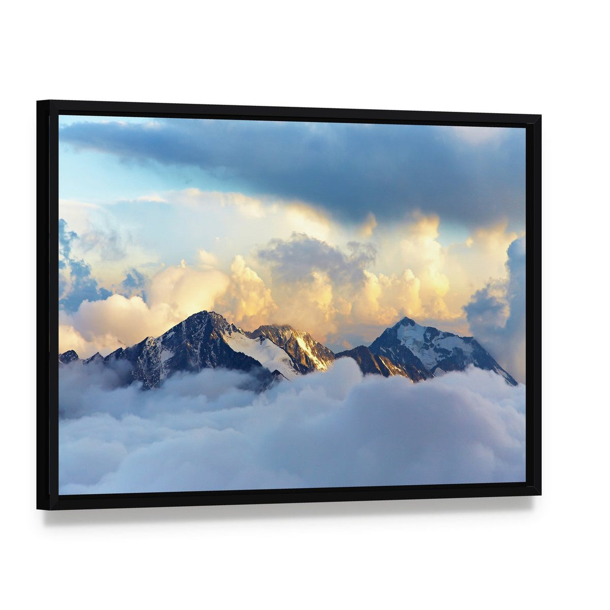 Snow-capped Mountain Peaks and Clouds Canvas Wall Art, framed canvas in a black floater frame, angled product view