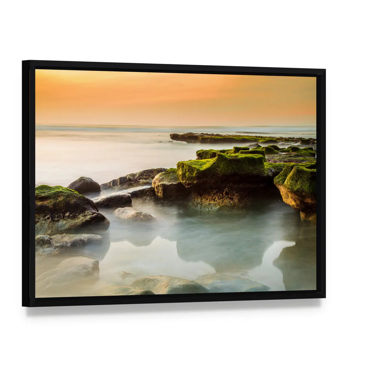 Rocky Del Mar Coastline Canvas Wall Art, framed canvas in a black floater frame, angled product view