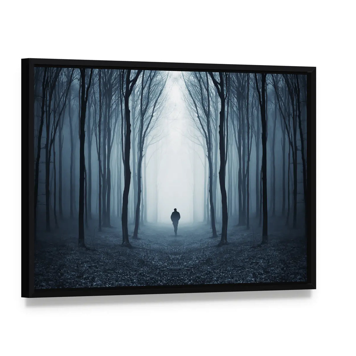 Man Walking Through A Fairytale Forest Canvas Wall Art, framed canvas in a black floater frame, angled product view
