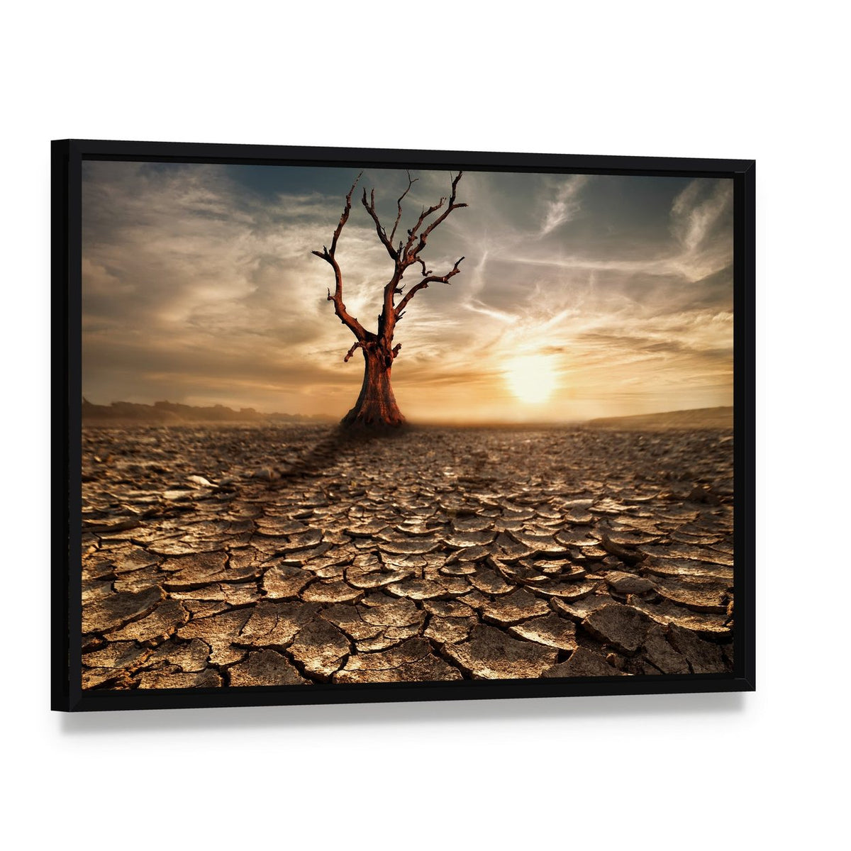 Sunset Over Drought-cracked Desert Canvas Wall Art, framed canvas in a black floater frame, angled product view