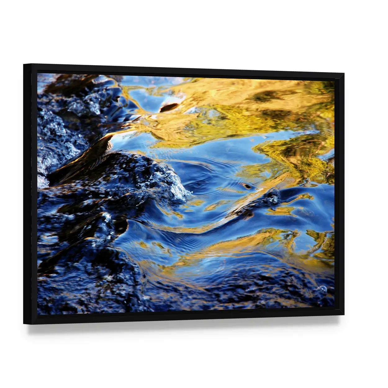 Autumn Trees Over Mountain Stream Canvas Wall Art, framed canvas in a black floater frame, angled product view