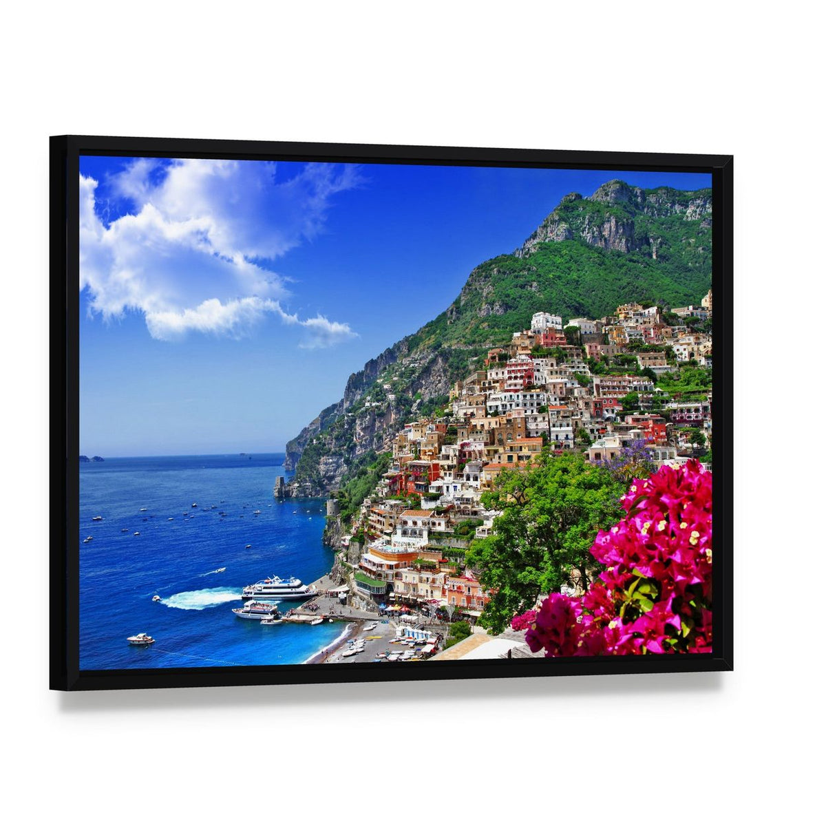 Positano Coastal Village Canvas Wall Art, framed canvas in a black floater frame, angled product view