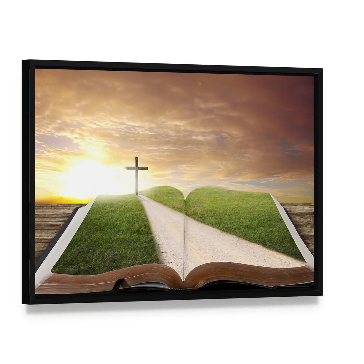 Open Bible with Grassy Field and Cross Canvas Wall Art, framed canvas in a black floater frame, angled product view