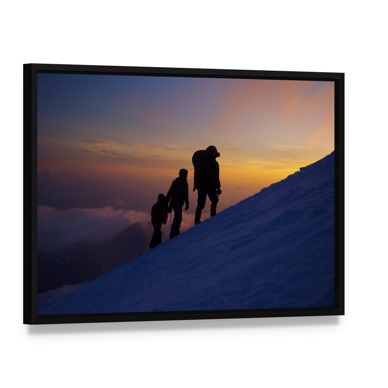 Climbers on Everest at Dusk Canvas Wall Art, framed canvas in a black floater frame, angled product view
