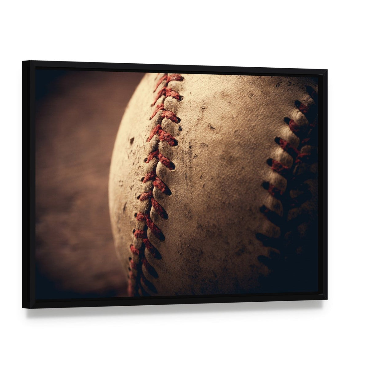 Old Baseball Canvas Wall Art, framed canvas in a black floater frame, angled product view