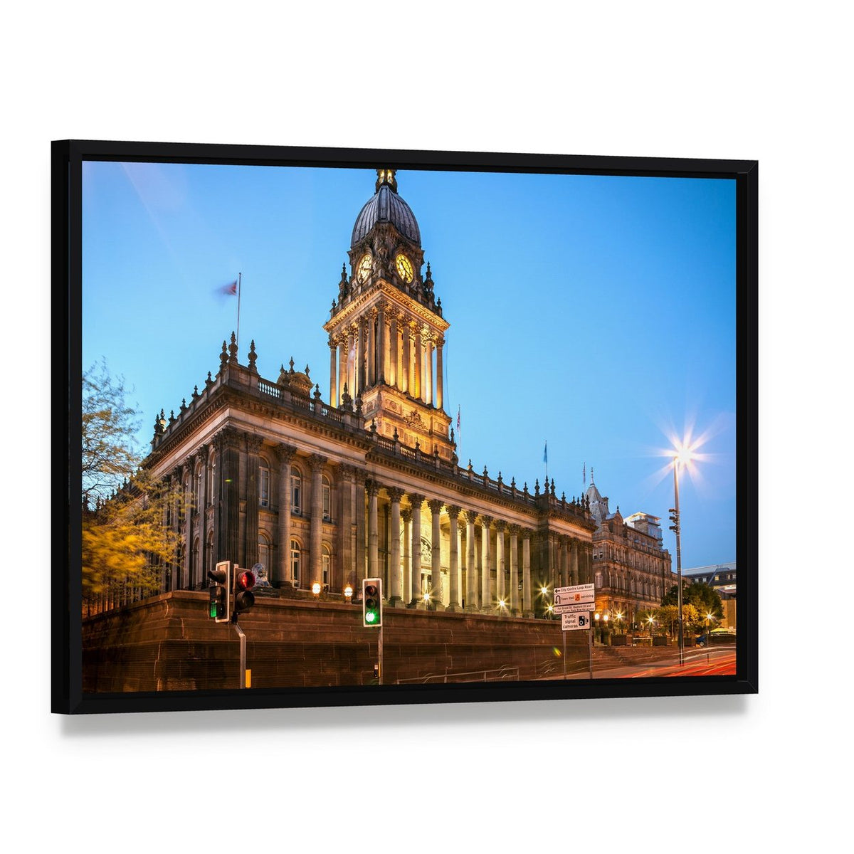 Illuminated Leeds Town Hall at Dusk Canvas Wall Art, framed canvas in a black floater frame, angled product view