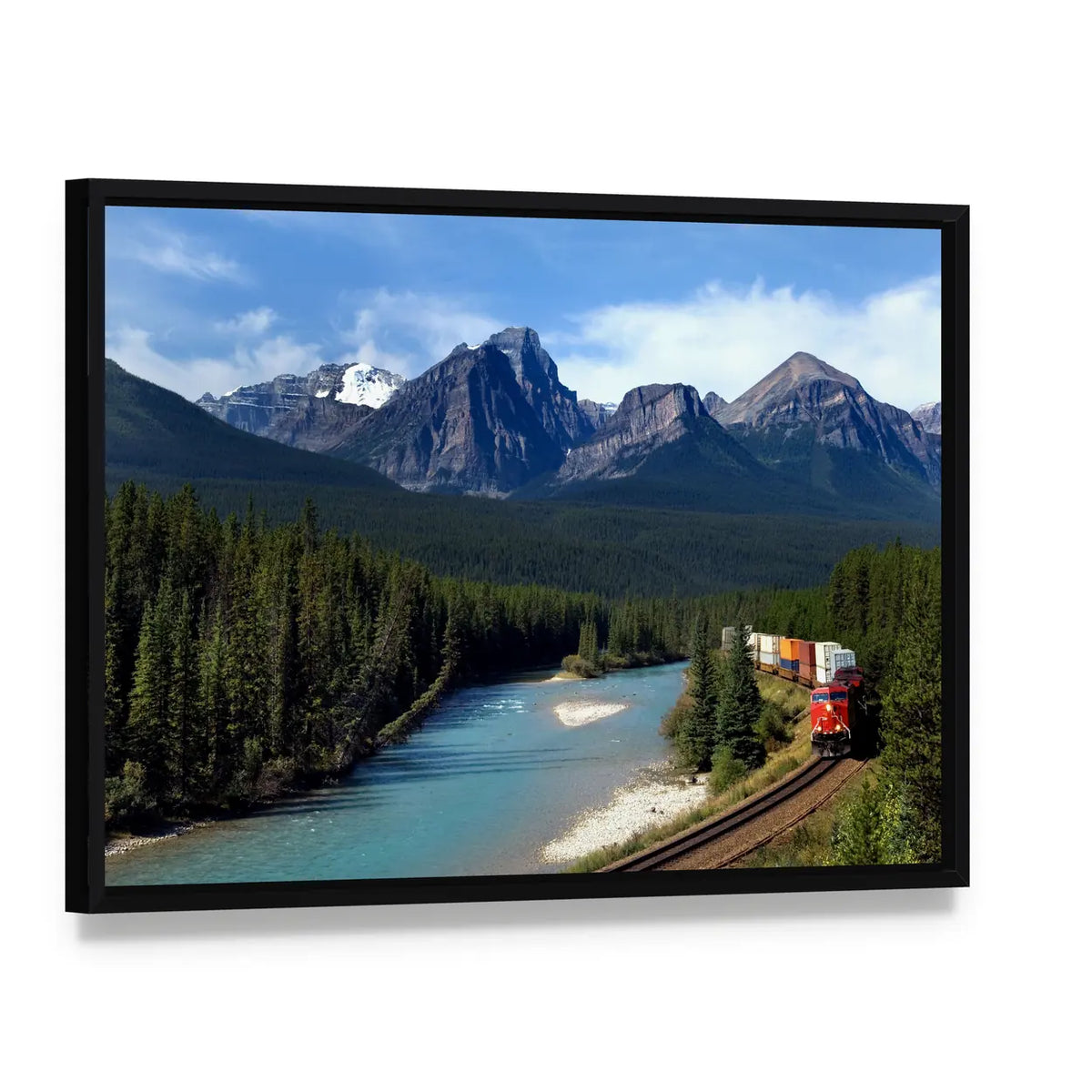 Train Along Bow River Canvas Wall Art, framed canvas in a black floater frame, angled product view