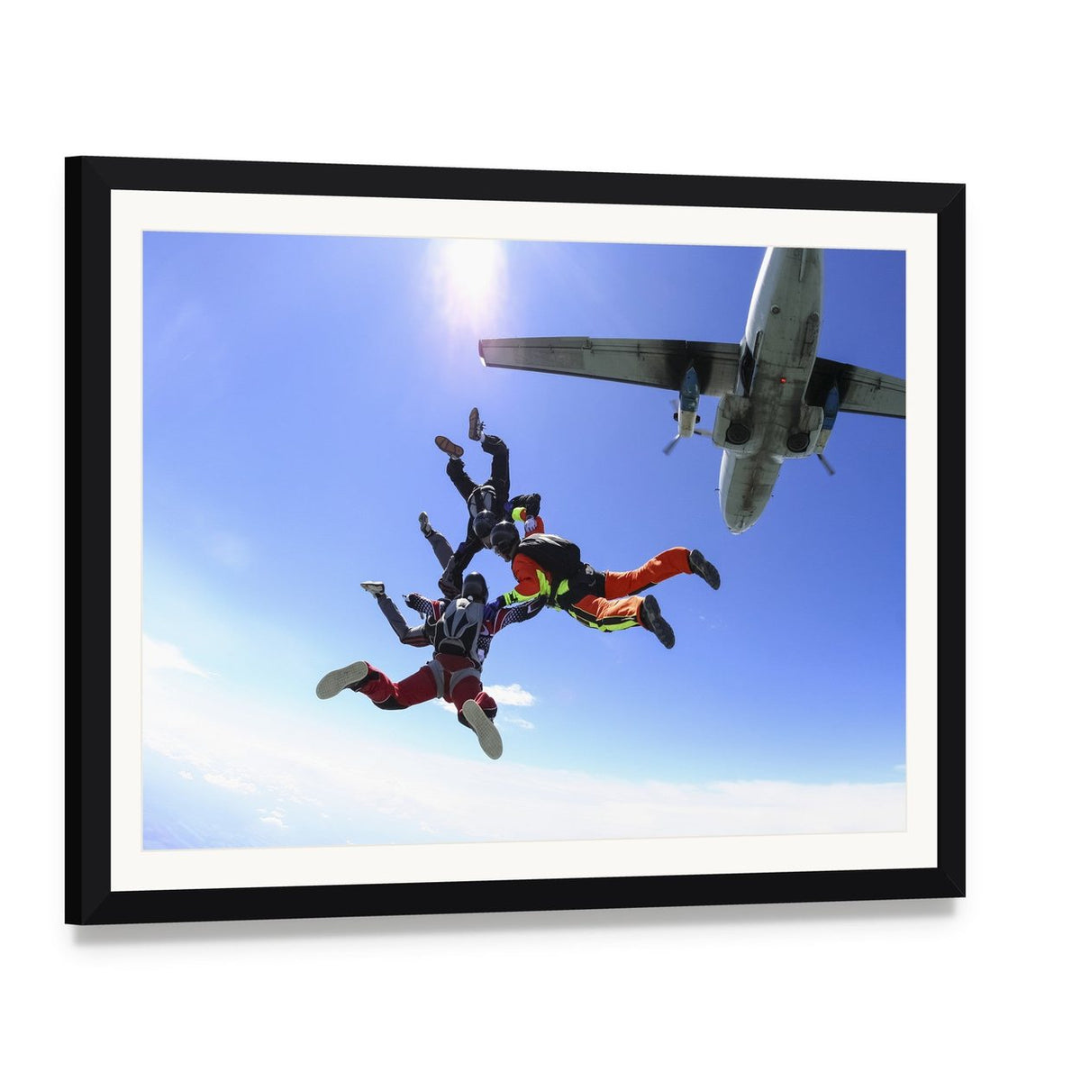 Exciting Skydiving Adventure with Airplane Canvas Wall Art, framed print with white mat and black frame, angled product view