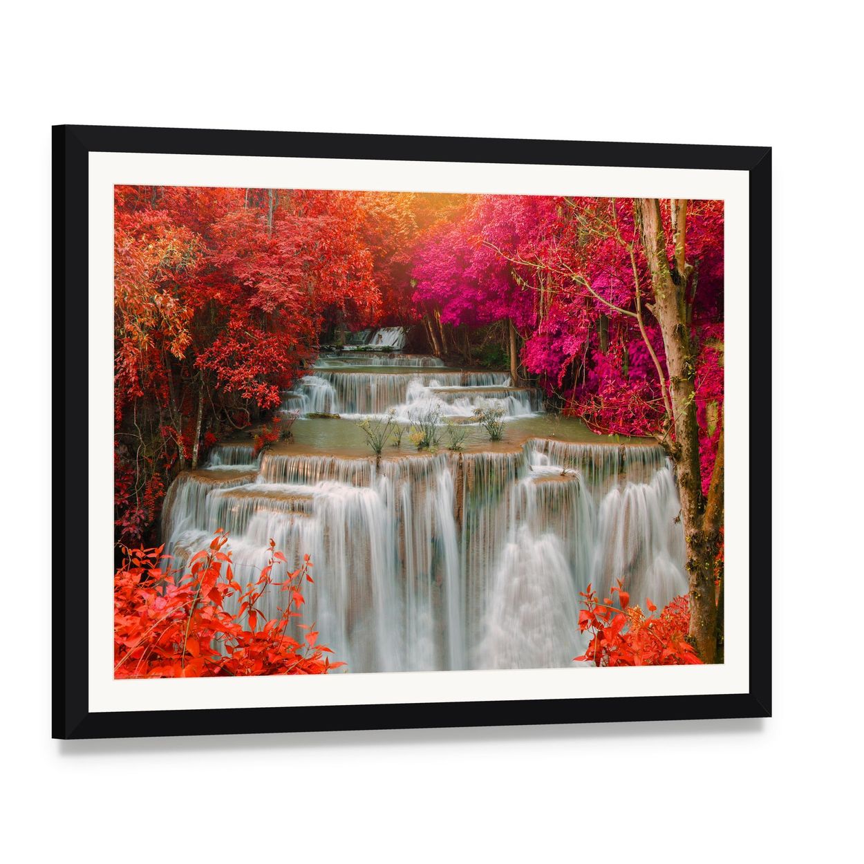 Waterfall in Pink and Red Trees Canvas Wall Art, framed print with white mat and black frame, angled product view