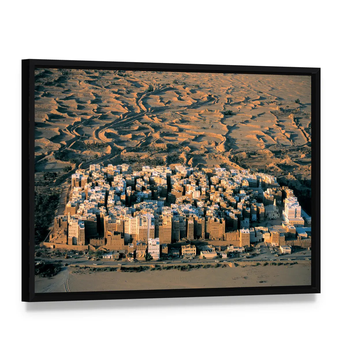 Desert Settlement at Golden Hour Canvas Wall Art, framed canvas in a black floater frame, angled product view