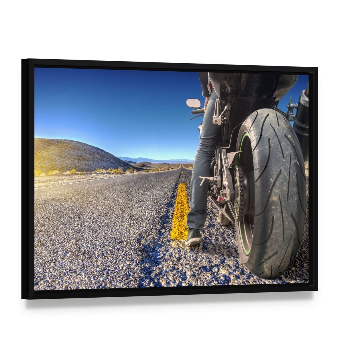 Motorcycle on Road Canvas Wall Art, framed canvas in a black floater frame, angled product view