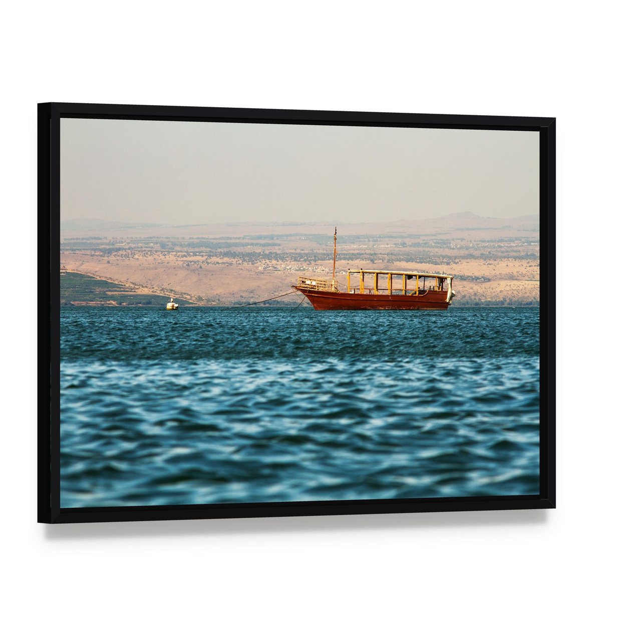 Wooden Boat on Calm Sea Canvas Wall Art, framed canvas in a black floater frame, angled product view