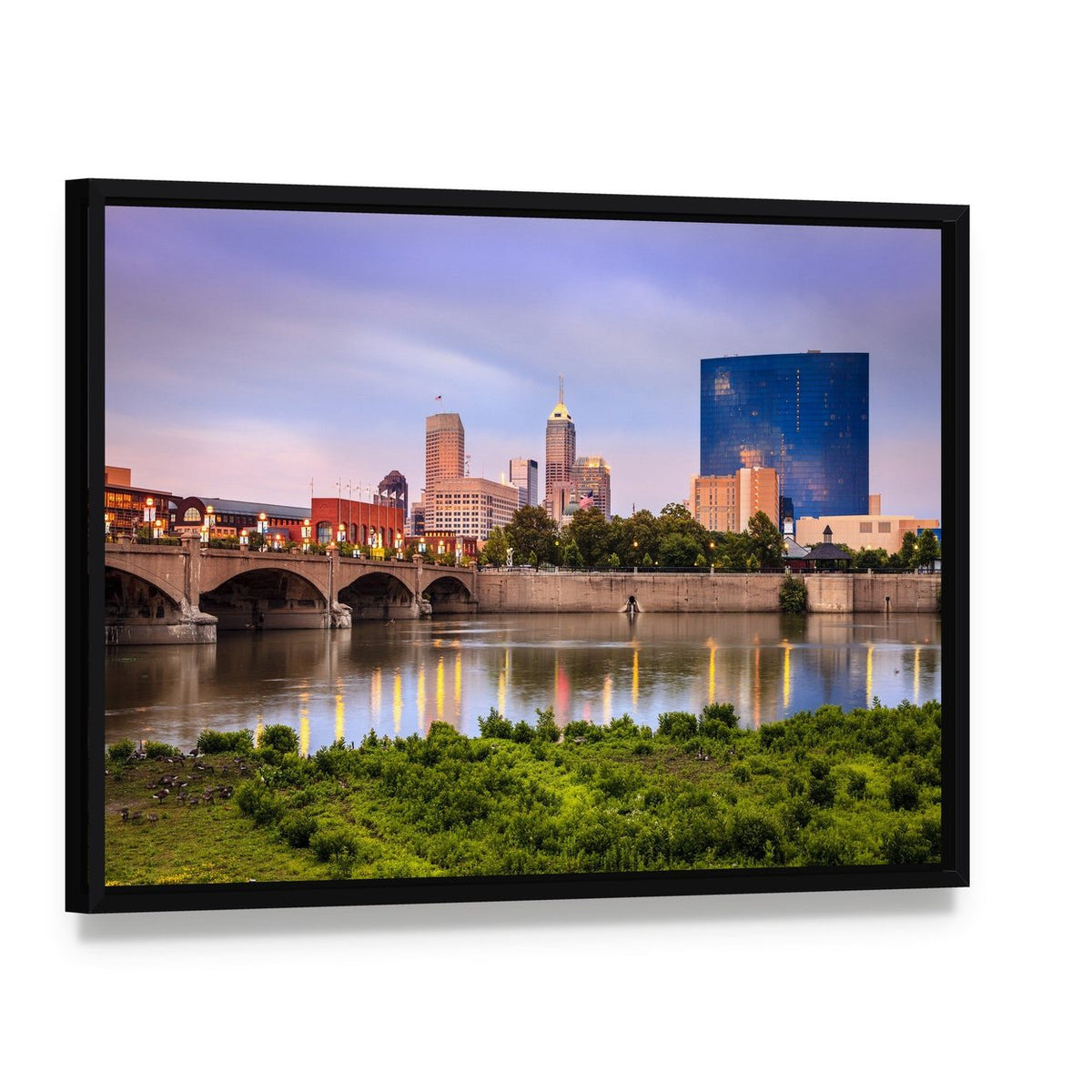Indianapolis Skyline at Sunset Canvas Wall Art, framed canvas in a black floater frame, angled product view