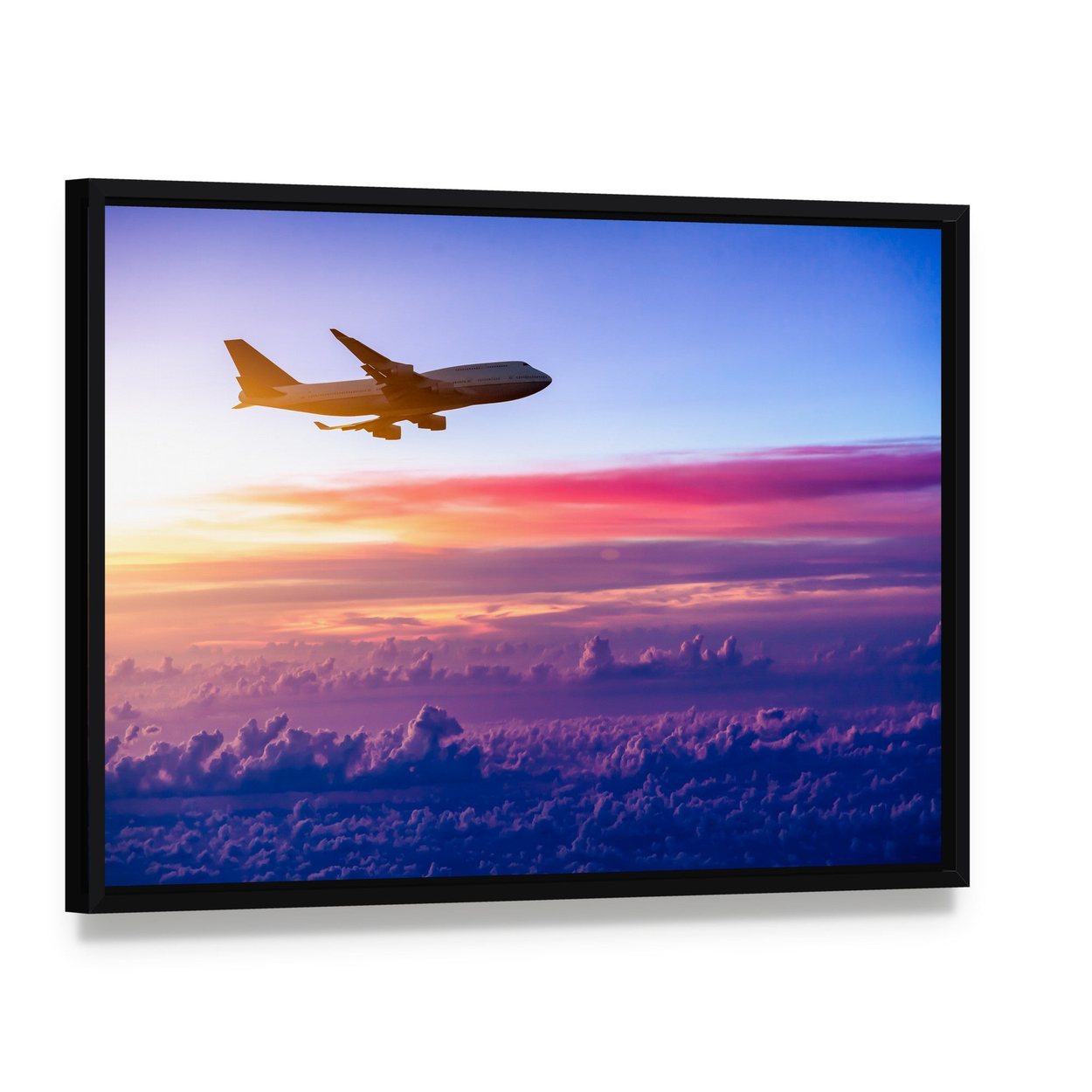 Airplane in the Sky Canvas Wall Art, framed canvas in a black floater frame, angled product view