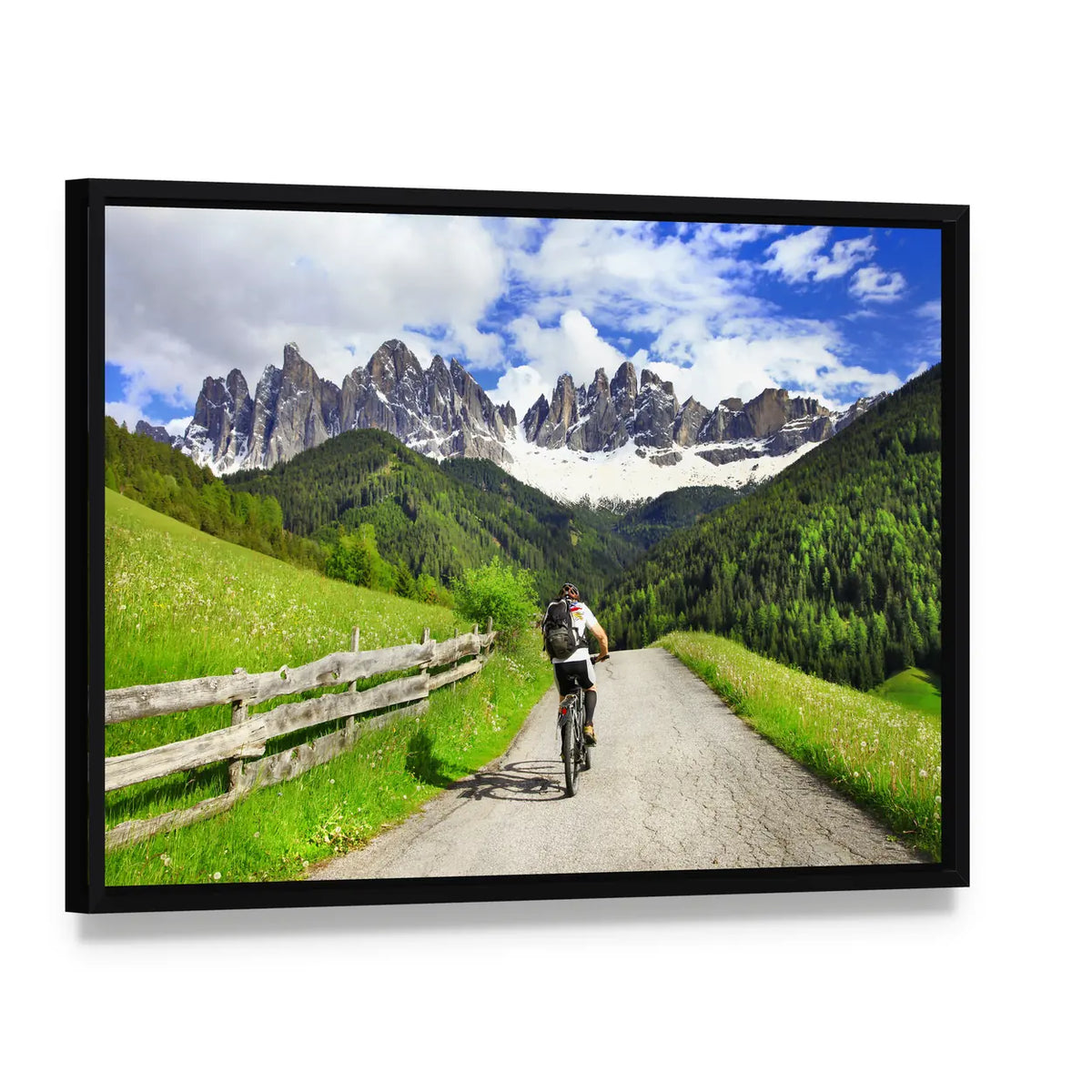 Cyclist on Mountain Road Canvas Wall Art, framed canvas in a black floater frame, angled product view