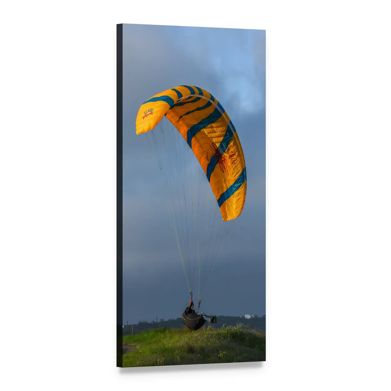 Orange and Blue Paraglider Over Hill Vertical Canvas Wall Art, 1 panel 1 Vertical layout gallery wrapped canvas set, angled product view