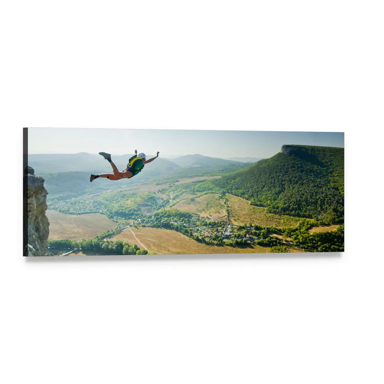 Base Jumper Over Mountain Valley Panoramic Canvas Wall Art, single panel gallery wrapped canvas, angled product view