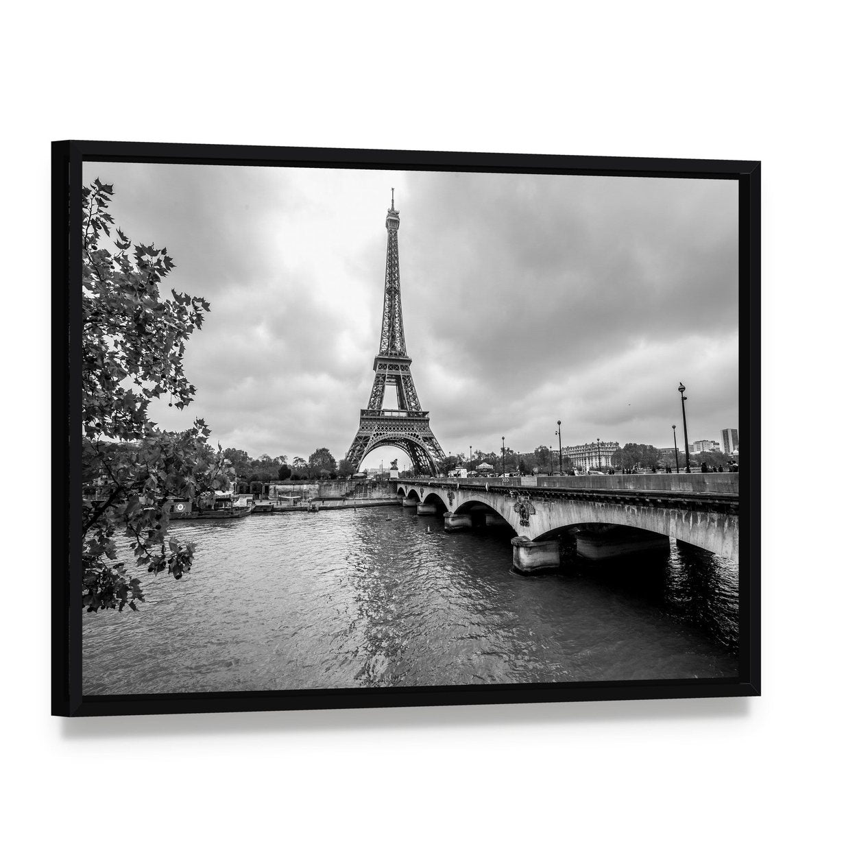 Eiffel Tower from Seine River Canvas Wall Art, framed canvas in a black floater frame, angled product view