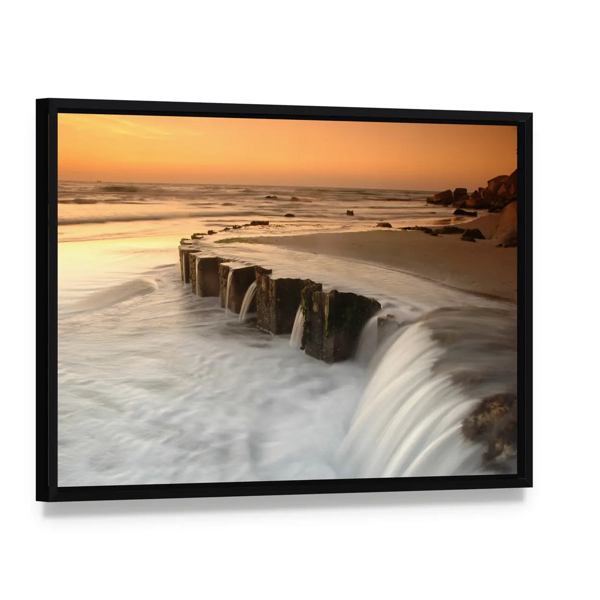Waterfall By The Sea At Sunset Canvas Wall Art, framed canvas in a black floater frame, angled product view