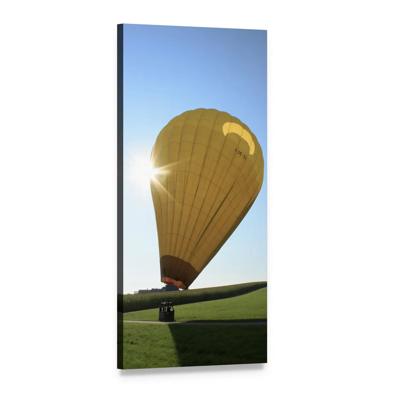 Yellow Hot Air Balloon Over Green Field Vertical Canvas Wall Art, 1 panel 1 Vertical layout gallery wrapped canvas set, angled product view