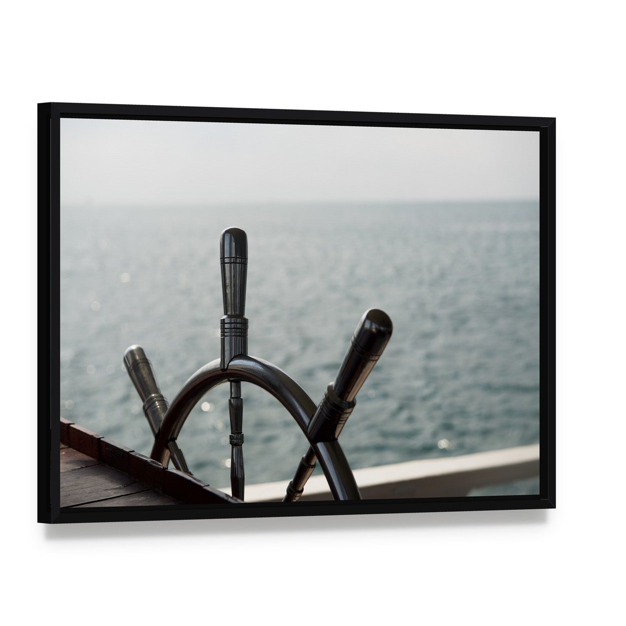 Wooden Ship Wheel Close-up Canvas Wall Art, framed canvas in a black floater frame, angled product view