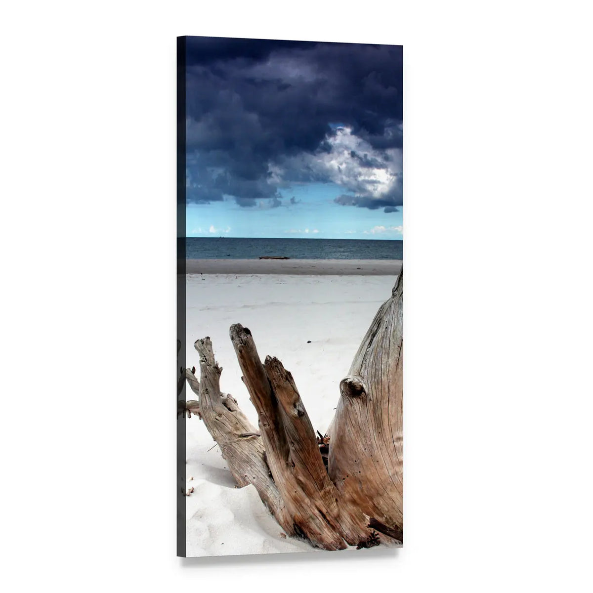 Driftwood on White Sand Beach Vertical Canvas Wall Art, 1 panel 1 Vertical layout gallery wrapped canvas set, angled product view