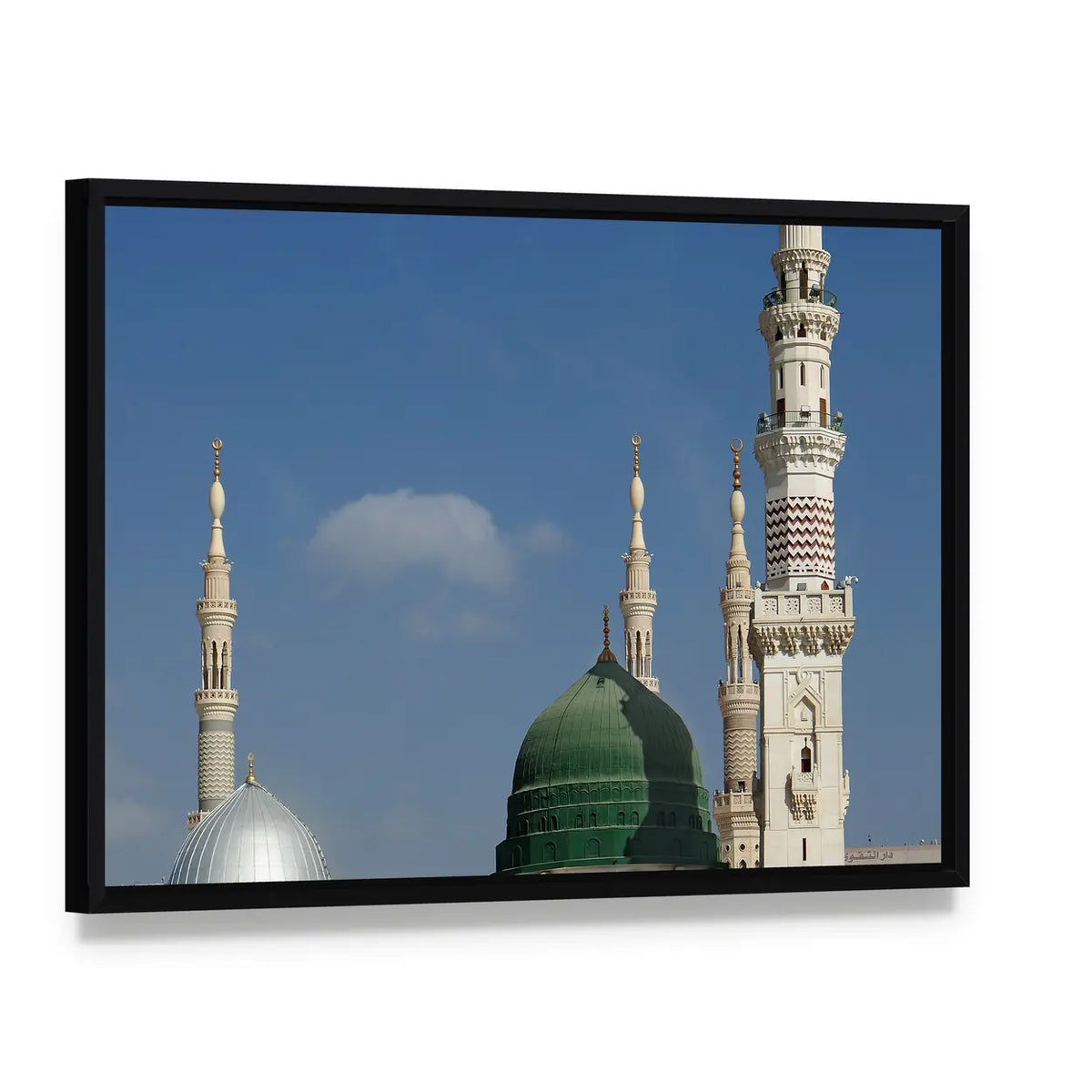Masjid E Nabawi Green Dome Canvas Wall Art, framed canvas in a black floater frame, angled product view