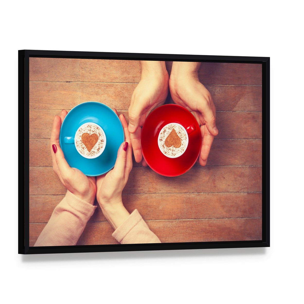 Couple Holding Coffee Cups Canvas Wall Art, framed canvas in a black floater frame, angled product view