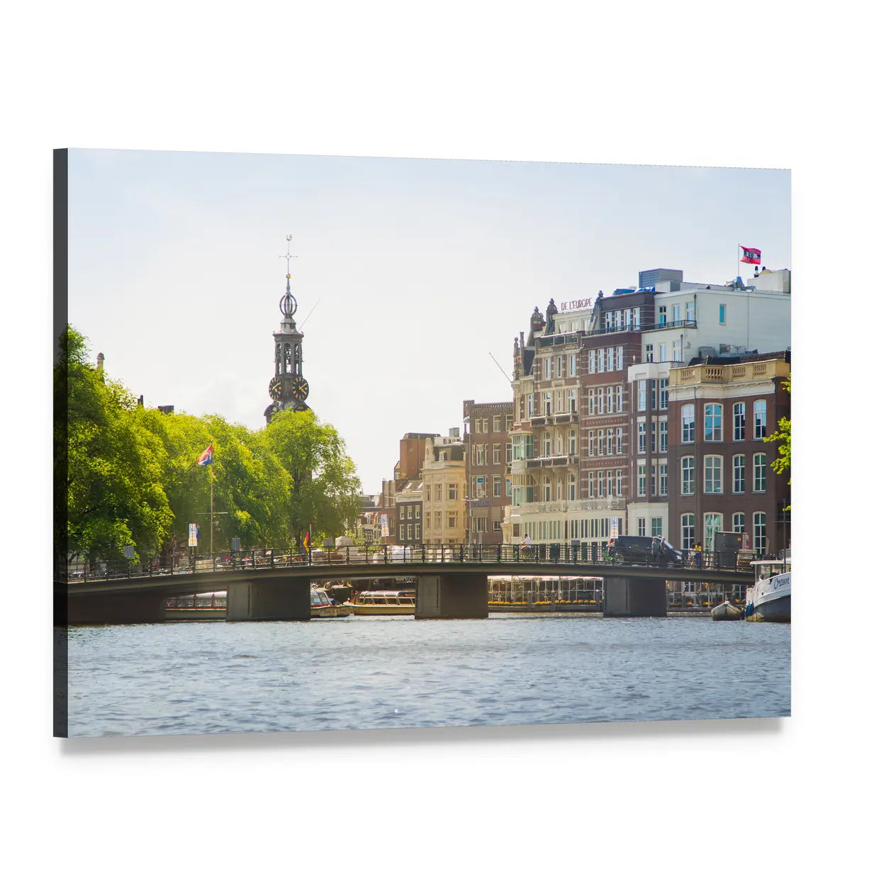 Amsterdam Canal with Spired Tower Canvas Wall Art, single panel gallery wrapped canvas, angled product view