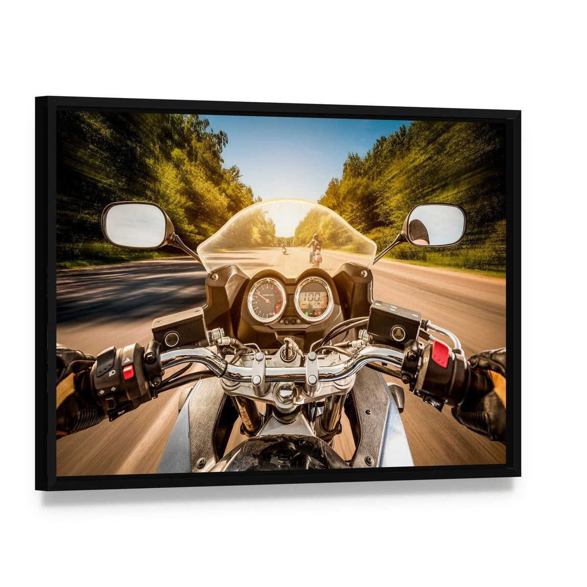 Biker Driving a Motorcycle Canvas Wall Art, framed canvas in a black floater frame, angled product view