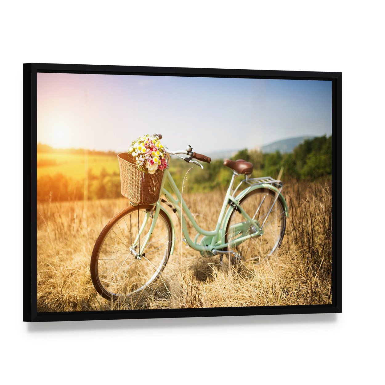 Vintage Bicycle with Flower Basket in Field Canvas Wall Art, framed canvas in a black floater frame, angled product view