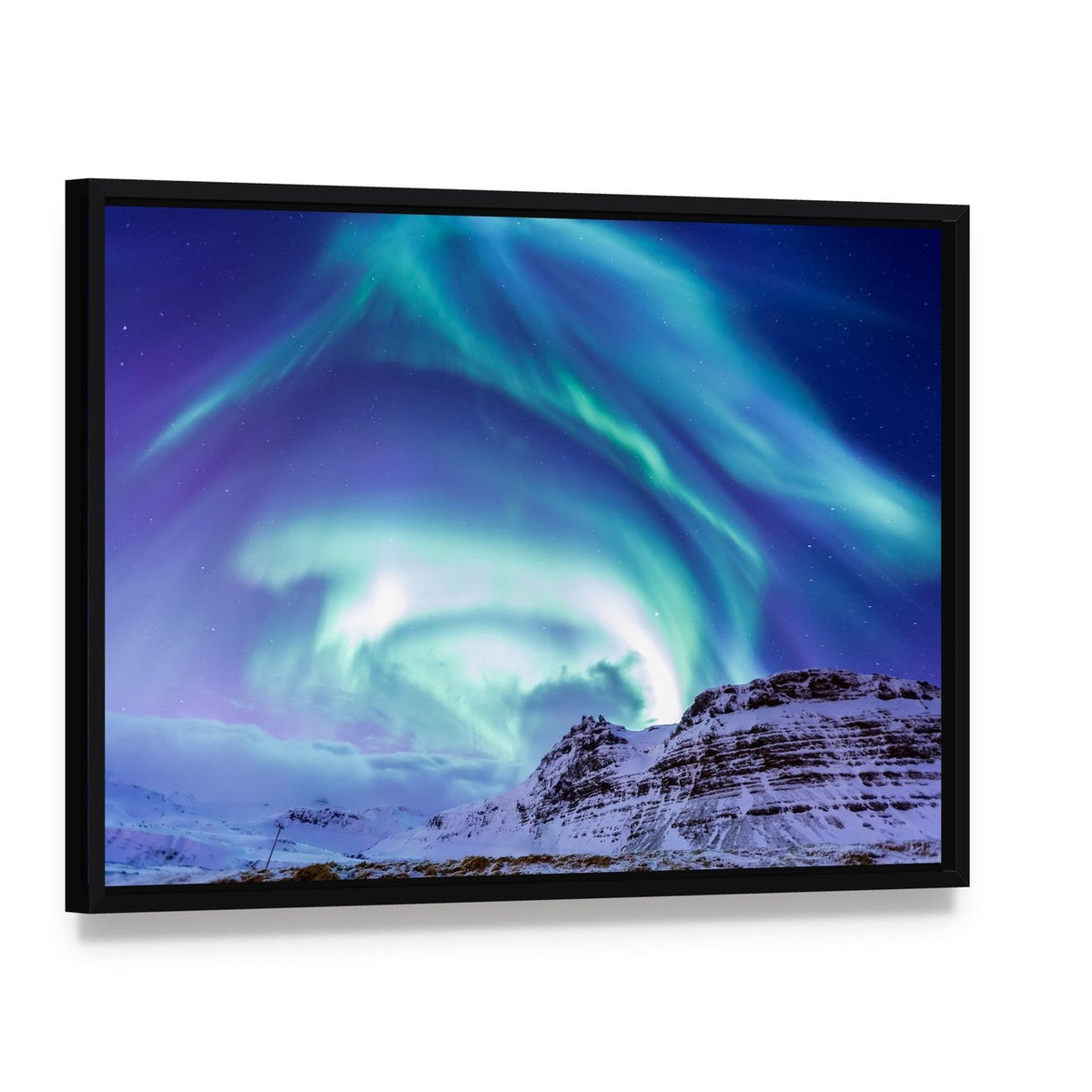 Aurora Over Kirkjufell Canvas Wall Art, framed canvas in a black floater frame, angled product view