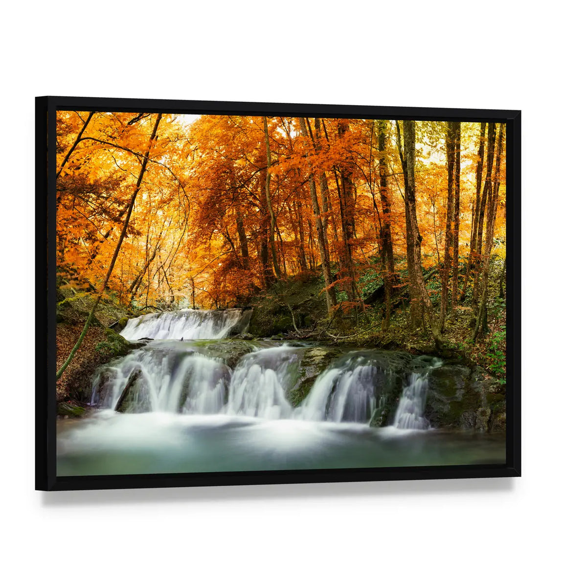 Waterfall In Autumn Forest Thailand Canvas Wall Art, framed canvas in a black floater frame, angled product view