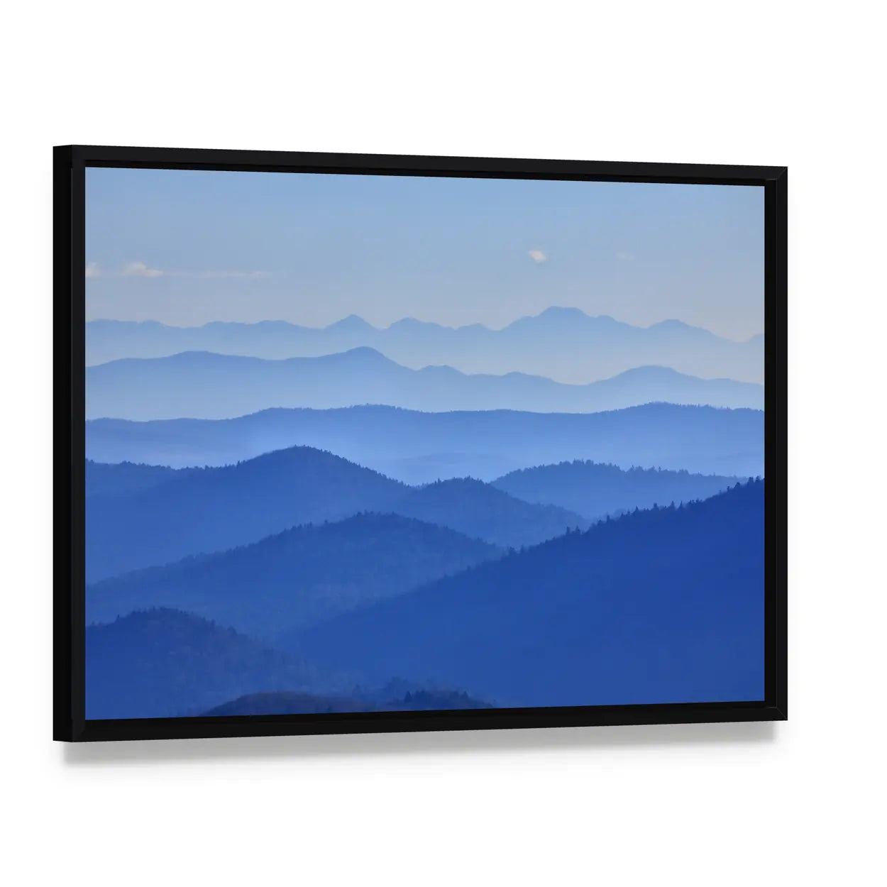 Misty Mountain Valley with Moon Canvas Wall Art, framed canvas in a black floater frame, angled product view