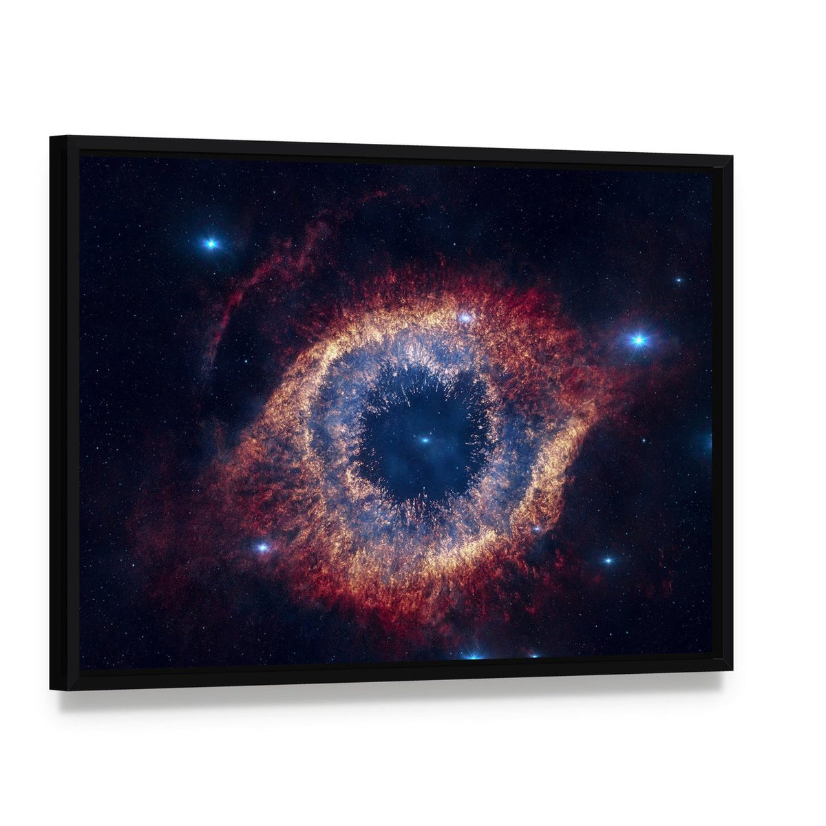 The Helix Nebula Eye of God Canvas Wall Art, framed canvas in a black floater frame, angled product view