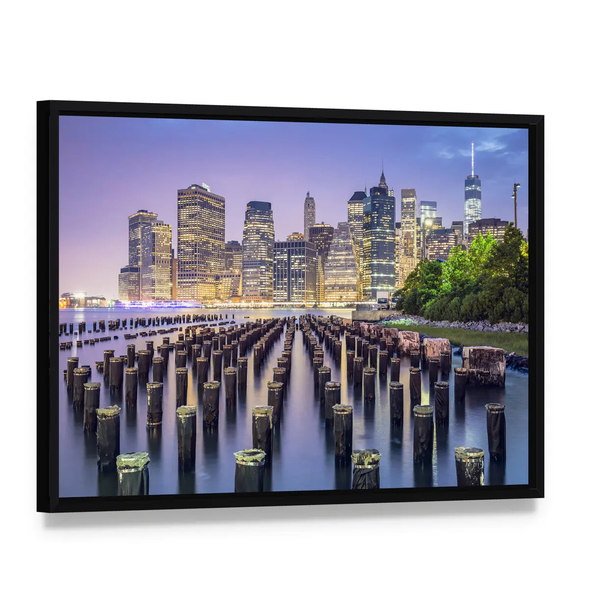 New York City Skyline At Night Canvas Wall Art, framed canvas in a black floater frame, angled product view