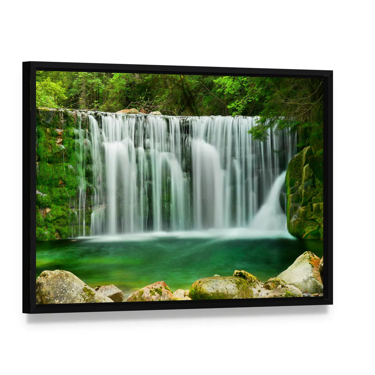 Lake Emerald Waterfalls Canvas Wall Art, framed canvas in a black floater frame, angled product view