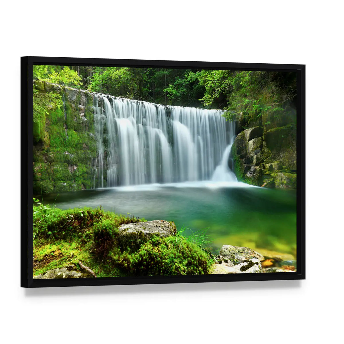 Emerald Lake Forest Waterfall Canvas Wall Art, framed canvas in a black floater frame, angled product view