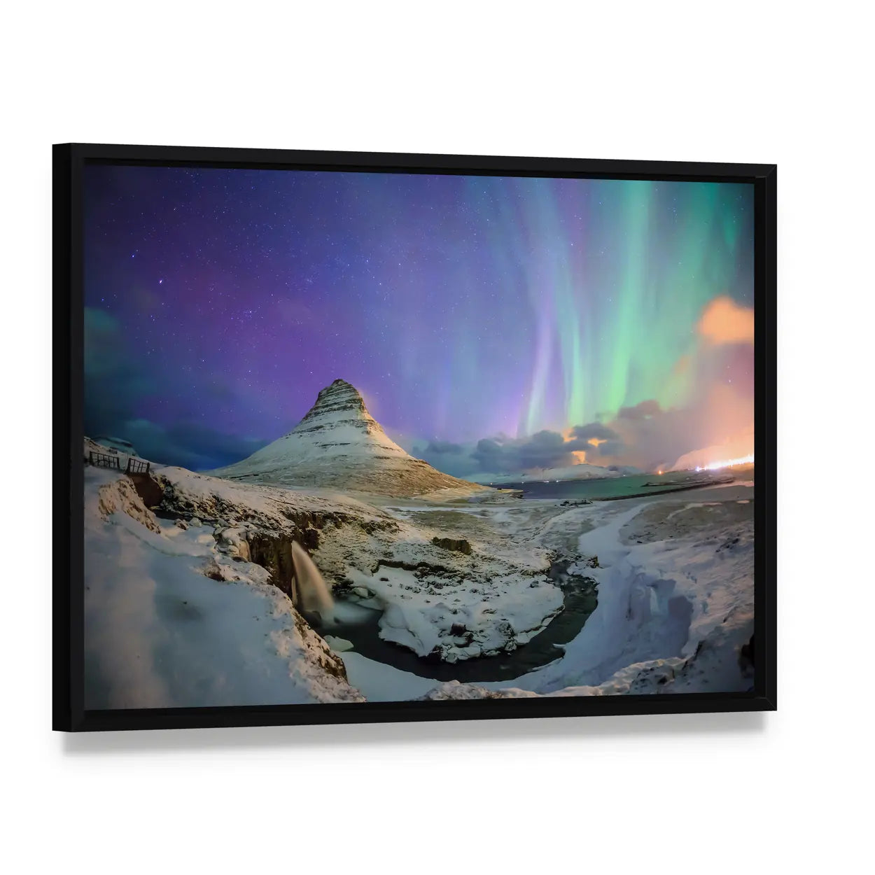 Northern Lights Over Kirkjufell Canvas Wall Art, framed canvas in a black floater frame, angled product view