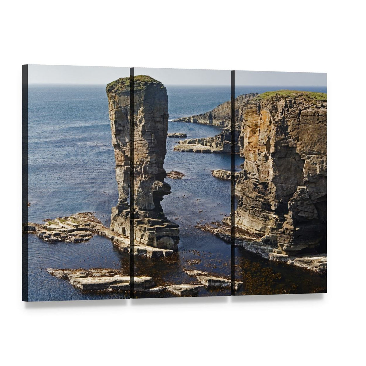 Weathered Sea Stack on Coastal Cliffs Canvas Wall Art, 3 panel 3 Horizontal layout gallery wrapped canvas set, angled product view