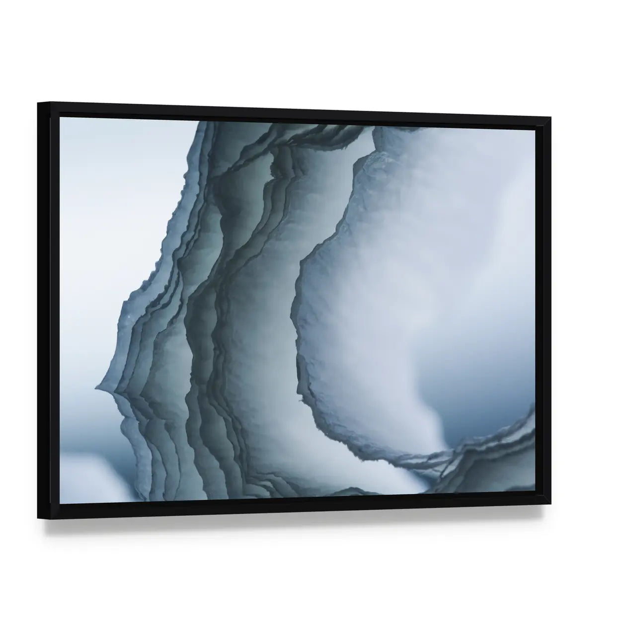 Sea Waves Composition Canvas Wall Art, framed canvas in a black floater frame, angled product view