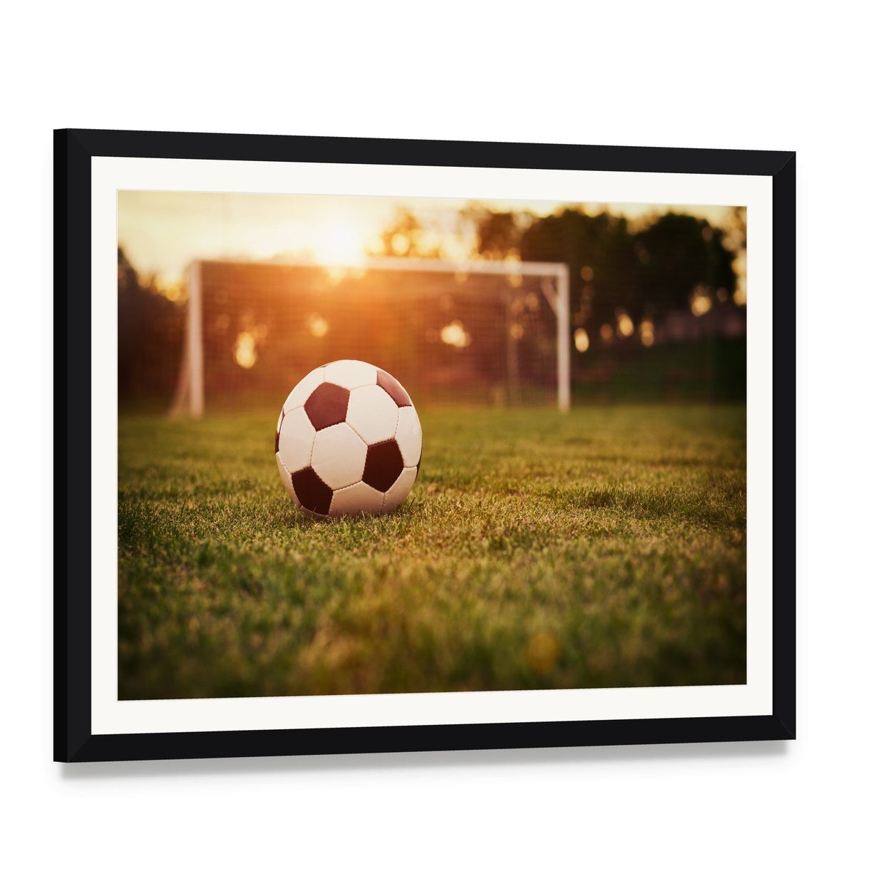 Soccer at Sunset Canvas Wall Art, framed print with white mat and black frame, angled product view