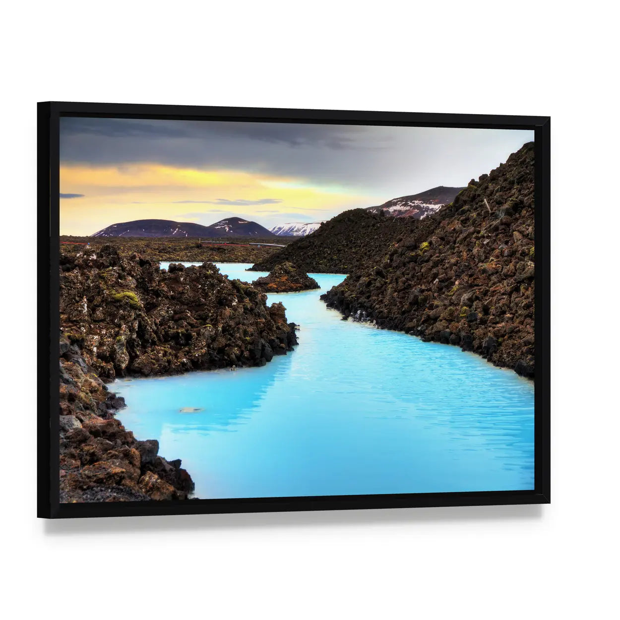 Blue Lagoon in Lava Field Canvas Wall Art, framed canvas in a black floater frame, angled product view