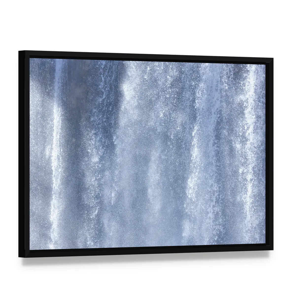 Waterfall Close-Up Canvas Wall Art, framed canvas in a black floater frame, angled product view