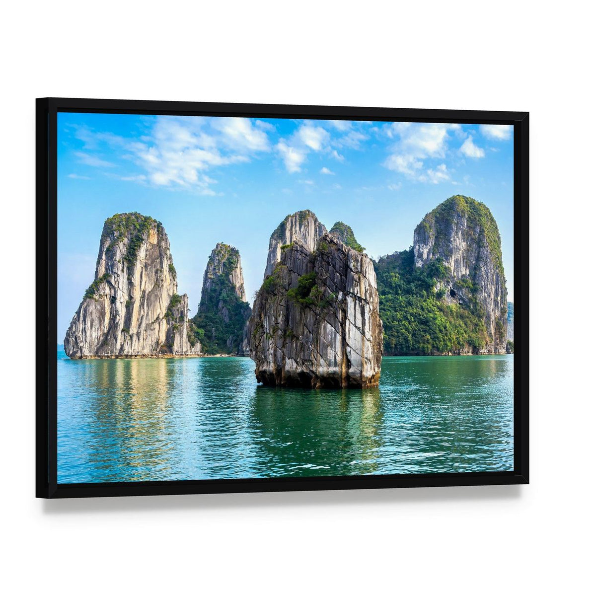 Limestone Karst Islands Over Turquoise Water Canvas Wall Art, framed canvas in a black floater frame, angled product view