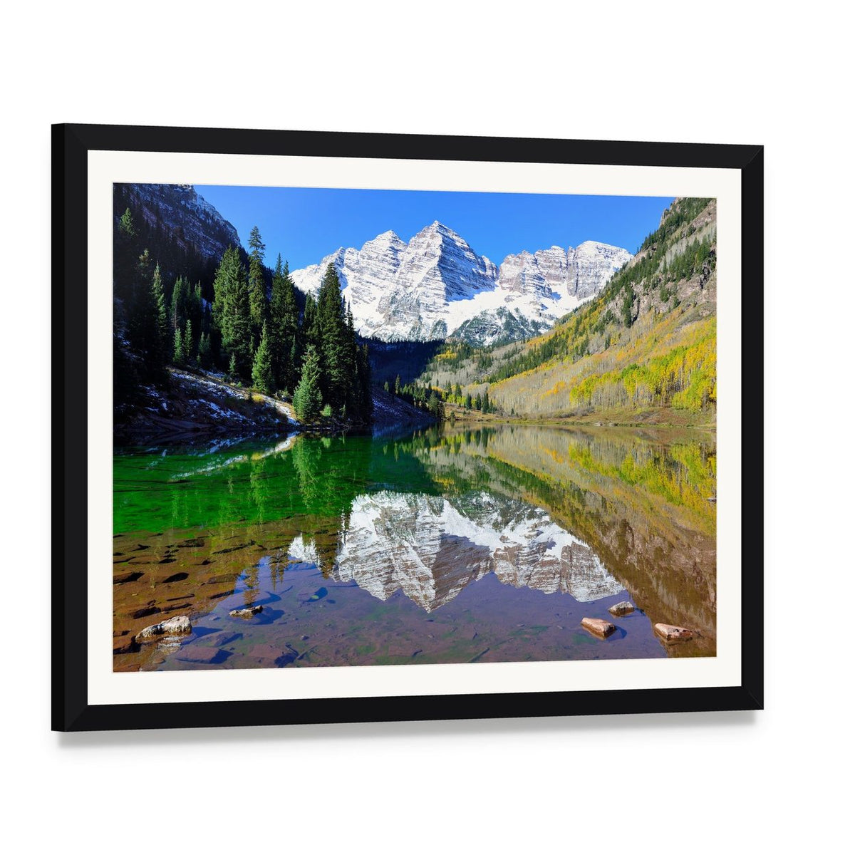 Maroon Bells Reflections in Autumn Foliage Canvas Wall Art, framed print with white mat and black frame, angled product view