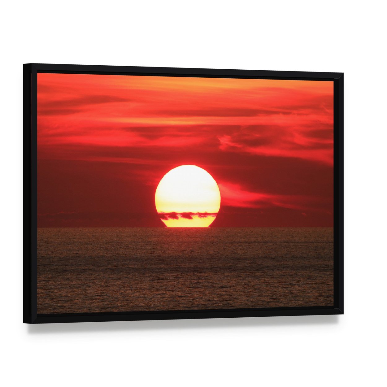 Sunset Over the Sea Canvas Wall Art, framed canvas in a black floater frame, angled product view