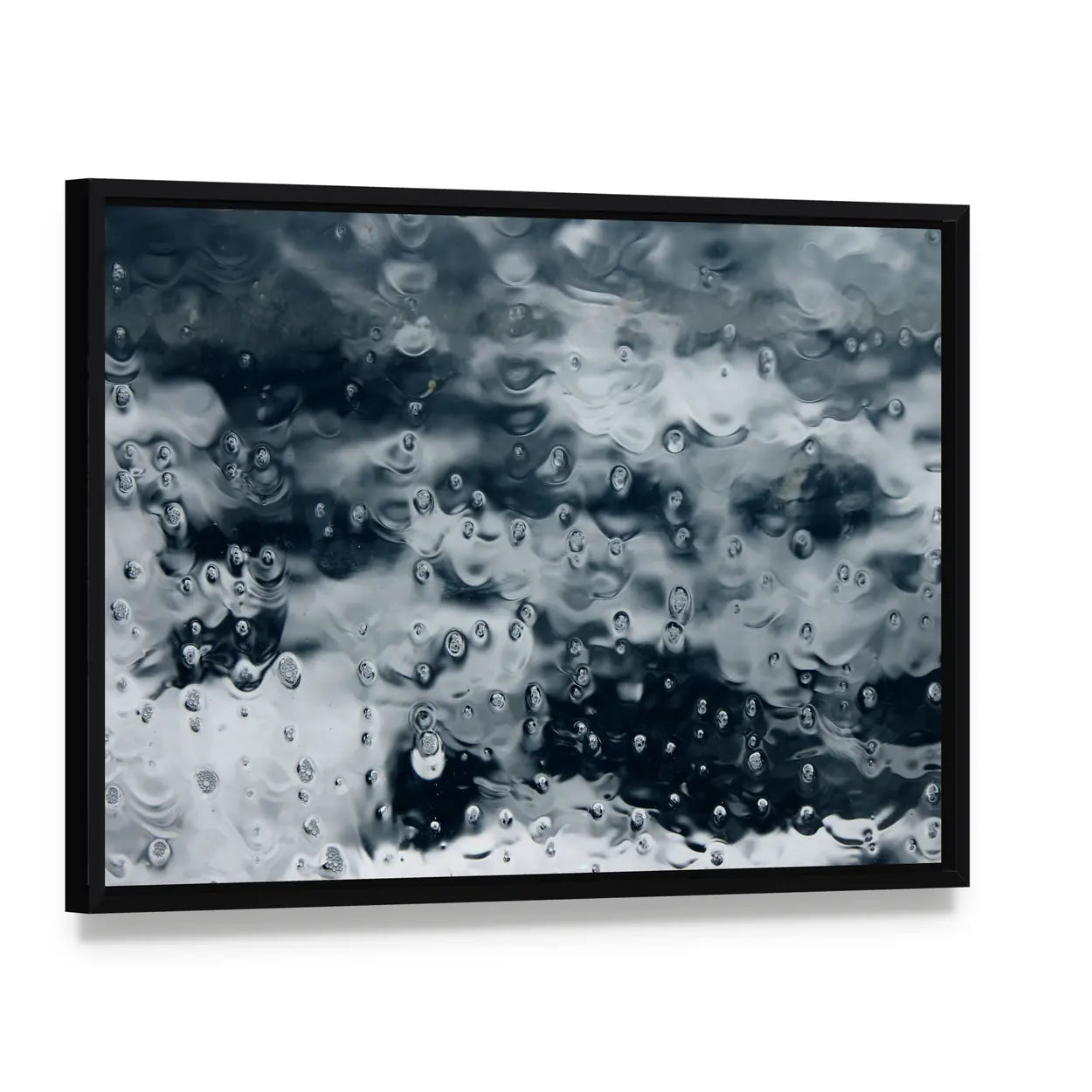 Ocean Spray on Boat Window Canvas Wall Art, framed canvas in a black floater frame, angled product view